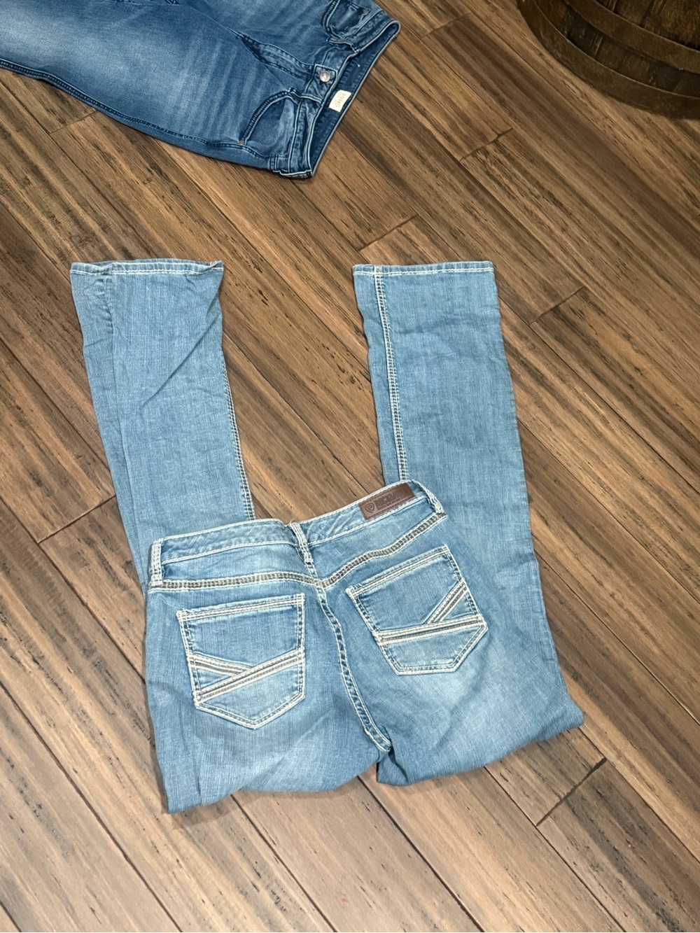 Light Blue Women's Skinny Jeans with Decorative Back Pockets